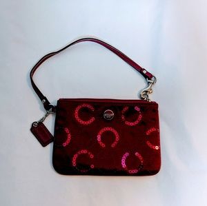 Coach red/burgundy wristlet with sequins